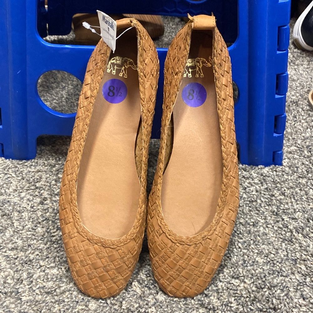 Brand new camel flats.  Leather, never worn.